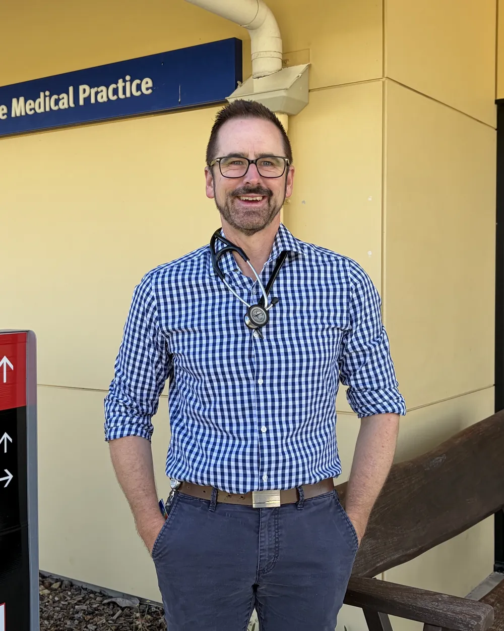 Dr Clay Rowe outside the practice entrance
