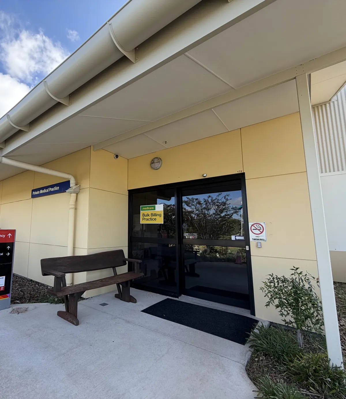 The practice entrance on Alice Street, with the Bulk Billing Practice sign on the door