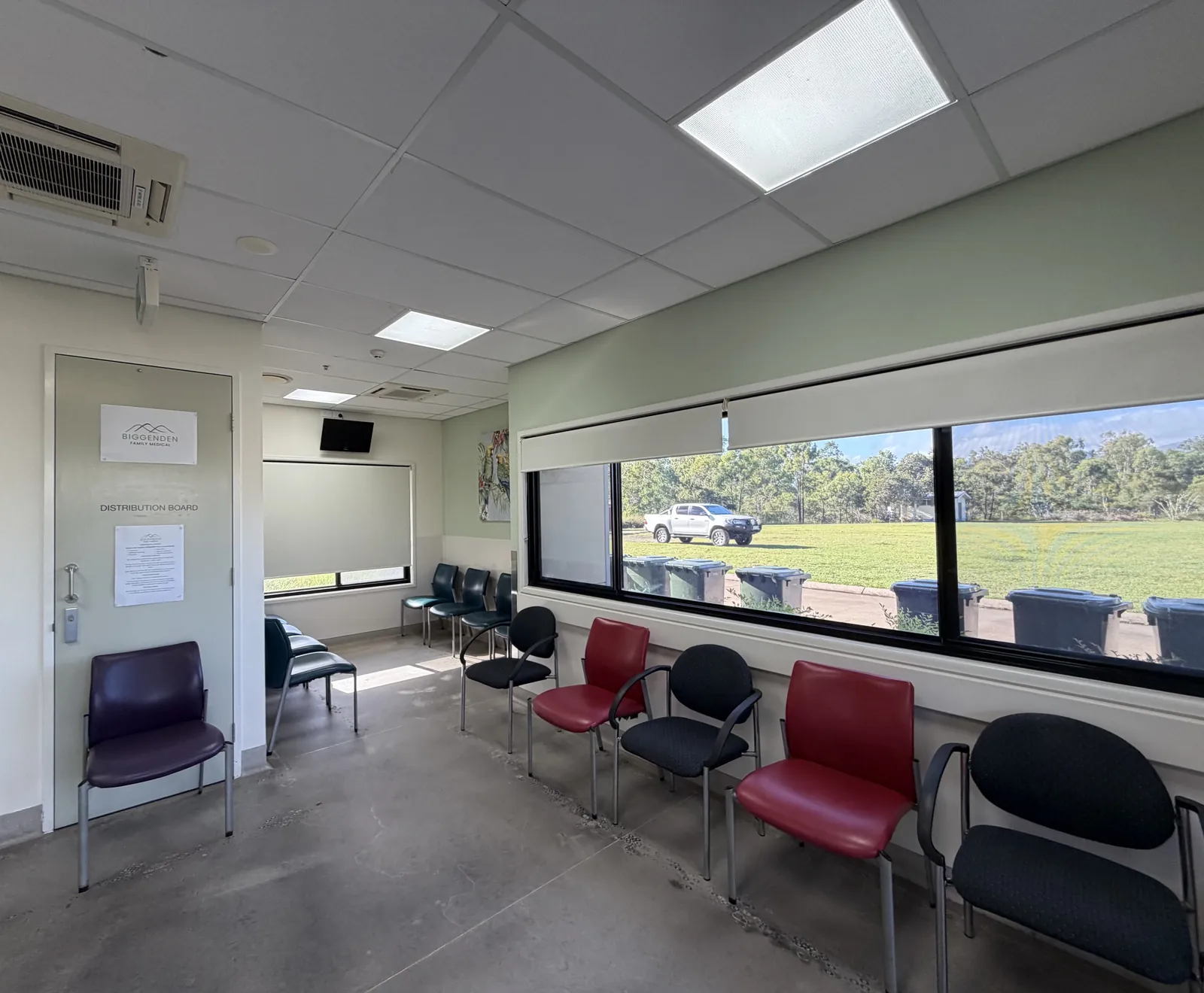 Waiting room with seating and views over the surrounding grounds